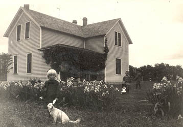 Two Girls in fronbt of Mueller Home