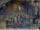 Photo of teacher and children